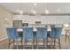 Beautiful kitchen with white cabinets, pendant lighting, and a large island with seating at 1204 Sparkling Lake Dr # 20, Apex, NC 27523