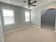 Inviting room with two windows and an arched doorway to another space, creating an open feel at 1316 Plunket Dr, Wake Forest, NC 27587