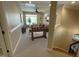 Upstairs bonus room featuring a foosball table, TV, and a seating area at 1316 Plunket Dr, Wake Forest, NC 27587