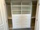 Interior view of closet featuring built-in shelving and drawers for optimal organization at 1316 Plunket Dr, Wake Forest, NC 27587