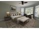 Inviting main bedroom boasts natural light, neutral walls, and elegant furnishings at 1316 Plunket Dr, Wake Forest, NC 27587