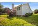 Exterior view featuring a wood deck and a well-maintained yard at 1401 Burchcrest Dr, Garner, NC 27529