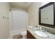 Bathroom featuring granite countertops, tile floors, and shower at 1401 Burchcrest Dr, Garner, NC 27529