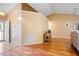 Spacious living room with beautiful hardwood floors, neutral walls and plenty of natural light at 1401 Burchcrest Dr, Garner, NC 27529