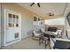A screened in porch with outdoor seating and a grill at 158 Arlie Ln, Lillington, NC 27546