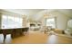 Versatile bonus room with bunk beds, dining area, and play area, offering endless possibilities for entertainment at 1620 Hunting Ridge Rd, Raleigh, NC 27615