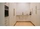 Well-equipped kitchen with custom cabinetry, modern appliances, and sleek countertops, designed for culinary enthusiasts at 1620 Hunting Ridge Rd, Raleigh, NC 27615