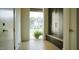 Functional mudroom with built-in storage, bench seating, and ample natural light, providing organizational convenience at 1620 Hunting Ridge Rd, Raleigh, NC 27615
