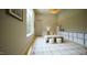 Bright playroom featuring a cozy seating area, a large window, and storage shelves at 1620 Hunting Ridge Rd, Raleigh, NC 27615