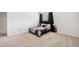 This secondary bedroom features neutral walls, carpet flooring, and a bright window at 170 Lothian, Rocky Mount, NC 27804
