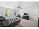This primary bedroom offers neutral walls, carpet flooring, and large windows at 170 Lothian, Rocky Mount, NC 27804