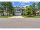 Charming two-story home featuring a two-car garage, stone accents, and well-maintained landscaping at 170 Lothian, Rocky Mount, NC 27804
