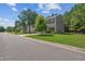 View of the side exterior of a charming home with well-maintained landscaping and a lush green lawn at 170 Lothian, Rocky Mount, NC 27804