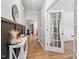 Bright hallway featuring wood floors, decorative wainscoting, and a stylish console table at 170 Lothian, Rocky Mount, NC 27804
