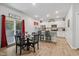 Eat-in kitchen features stainless appliances, granite countertops, and an island for casual dining and meal preparation at 170 Lothian, Rocky Mount, NC 27804