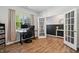 Bright home office features wood floors, a comfortable desk, and a doorway to the hallway at 170 Lothian, Rocky Mount, NC 27804