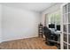 Home office featuring wood floors, a large window, and a comfortable ergonomic chair at 170 Lothian, Rocky Mount, NC 27804