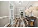 Spacious entryway features hardwood floors, neutral walls, and a console table with lamps at 178 Greenwich Dr, Sanford, NC 27330