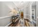 Inviting entryway boasts hardwood floors, elegant decor, and neutral gray paint at 178 Greenwich Dr, Sanford, NC 27330