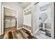 Open-concept entryway showcasing a mudroom area, powder room, and laundry room, offering both style and functionality at 178 Greenwich Dr, Sanford, NC 27330