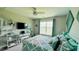 Bedroom featuring ample natural light, ceiling fan, a desk, and neutral paint at 192 Waterpine Dr, Garner, NC 27529