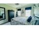 Bedroom with dark furniture, decorative ladder, and neutral walls at 192 Waterpine Dr, Garner, NC 27529