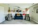 Entertainment room featuring comfortable arm chairs, leather sofa and wall art at 192 Waterpine Dr, Garner, NC 27529
