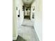Hallway with carpet flooring that leads to other rooms in the home at 192 Waterpine Dr, Garner, NC 27529