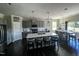 Spacious kitchen featuring an island with barstool seating and stainless steel appliances at 192 Waterpine Dr, Garner, NC 27529