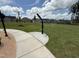 Community misting station surrounded by grassy lawns in a comfortable outdoor setting at 2106 Pink Peony Cir # 146, Durham, NC 27703