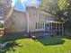 Exterior view of home with deck and backyard at 2408 Tiltonshire Ln, Apex, NC 27539
