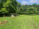 Large backyard with playground at 2408 Tiltonshire Ln, Apex, NC 27539