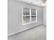Bright bedroom featuring a ceiling fan and a window at 2408 Tiltonshire Ln, Apex, NC 27539