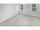 Clean bedroom with soft carpet and bright natural light at 2408 Tiltonshire Ln, Apex, NC 27539