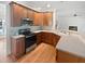 Well-equipped kitchen with stainless steel appliances and plenty of counter space at 2408 Tiltonshire Ln, Apex, NC 27539