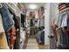 Spacious walk-in closet with custom shelving and hanging racks, maximizing storage and organization at 241 Teague St, Wake Forest, NC 27587