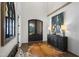Open and airy foyer with wood floors and stylish decor at 241 Teague St, Wake Forest, NC 27587