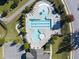 Overhead shot of community pool featuring ample seating and lush landscaping at 241 Teague St, Wake Forest, NC 27587