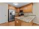 Kitchen featuring granite countertops, stainless-steel appliances, and a large island at 276 Sagamore Dr, Louisburg, NC 27549