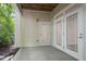 Back porch with neutral siding and direct access to the home's interior; perfect for entertaining at 2810 Bedford Green Dr # 5, Raleigh, NC 27604
