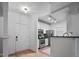 Bright modern kitchen featuring white cabinets, stainless steel appliances, and a tile floor at 2810 Bedford Green Dr # 5, Raleigh, NC 27604