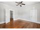 Spacious bedroom with a ceiling fan, hardwood floors, and neutral paint at 2927 S Church St, Rocky Mount, NC 27803
