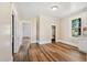 Open living room featuring updated flooring, natural light, and neutral paint at 2927 S Church St, Rocky Mount, NC 27803
