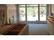 Bright kitchen featuring a large window, unfinished wood cabinetry, and abundant natural light during renovations at 3004 William Frederick Way, Raleigh, NC 27603