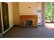 Outdoor patio featuring a wood fireplace and wooden deck, perfect for entertaining during renovations at 3004 William Frederick Way, Raleigh, NC 27603