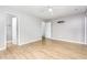 Large, light-filled bedroom with hardwood floors and a modern ceiling fan at 303 Applecross Dr, Cary, NC 27511