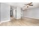Open-concept living space featuring hardwood floors, neutral walls, and seamless flow at 303 Applecross Dr, Cary, NC 27511