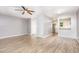 Bright living area showcasing hardwood floors, light gray walls, and an open concept design at 303 Applecross Dr, Cary, NC 27511