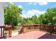 Spacious back deck overlooks the beautiful green lawn and playground at 318 Riggsbee Farm Dr, Cary, NC 27519