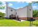 Two-story home features a beautiful backyard, complete with patio, furniture set, and playset at 318 Riggsbee Farm Dr, Cary, NC 27519